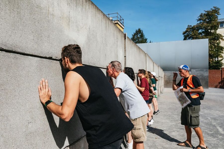 Berlin: Cold War Era History Guided Bike Tour - Brandenburg Gate and Wall fragments: a meaningful finish to the ride