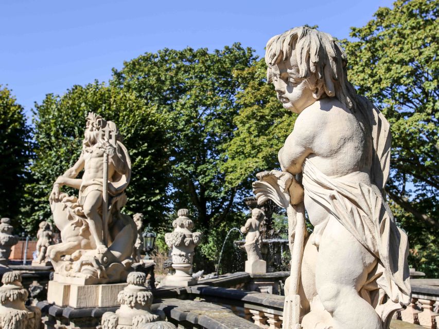 Dresden: Guided City Walk with a Cup of Coffee - Zwinger: baroque details and the feeling of a planned stage