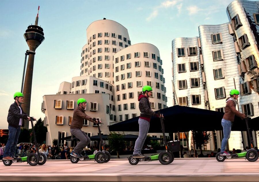 Düsseldorf: E-Scooter City Tour - Guides, tone, and the kind of city story you’ll hear