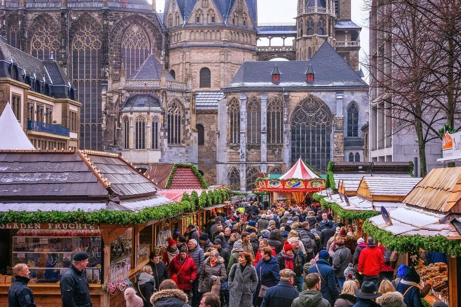 Explore Aachen with Passionate Tour Guides - Starting at Starbucks Markt 41 with a red umbrella