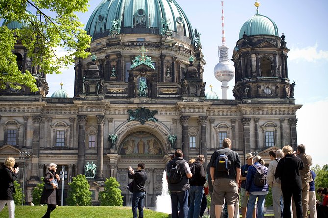 Explore Berlin Shore Excursion: Top Attractions Private Tour from Warnemuende - East Side Gallery murals along the Spree