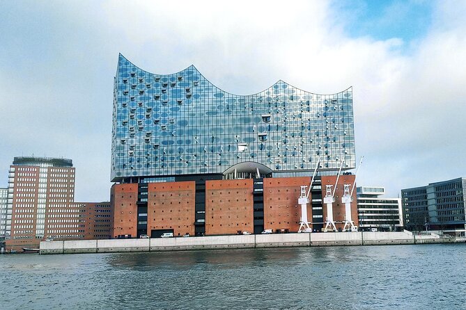 Free Tour: History of the Port, Red Light District and the Beatles - Beatles-Platz: a short stop that helps you connect the dots