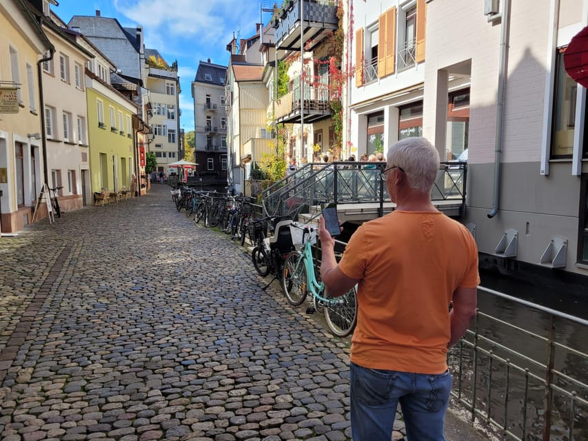 Freiburg: Self-Guided Audio Tour in English - Watch-outs: headphones, wheelchair access, and the password step