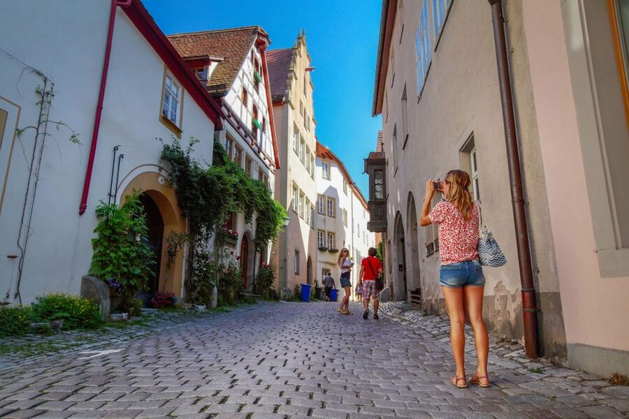 From Munich: Rothenburg and Nördlinger Ries Day Trip by Bus - How the tour guide, audio, and group pacing work