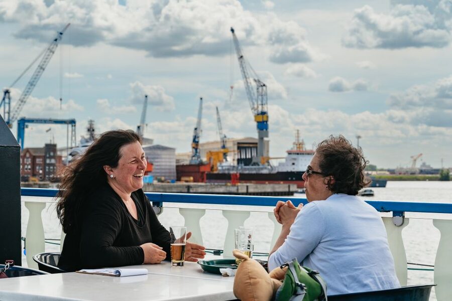 Hamburg: 1-Hour Harbor Sightseeing Cruise with HafenCity - Onboard comfort: sun deck, air-conditioned lounge, and glass roof weather rules