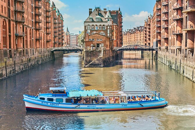 Hamburg: 1-hour harbor tour - Container terminals, cranes in motion, and ship-loading spectacle