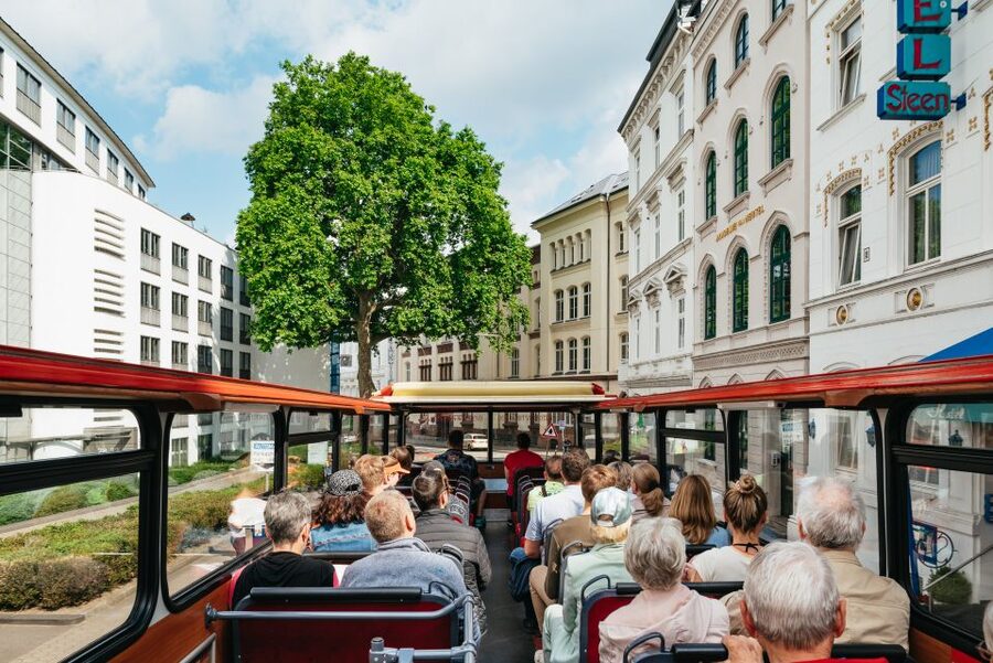 Hamburg: Line A Sightseeing Hop-On Hop-Off Bus Tour - City center icons: Rathaus, St. Michael’s Church, and Jungfernstieg