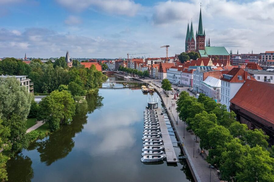 Lübeck: Electric Boat Rental - without driving licence - What You See: Harbor Views in a UNESCO City Feel