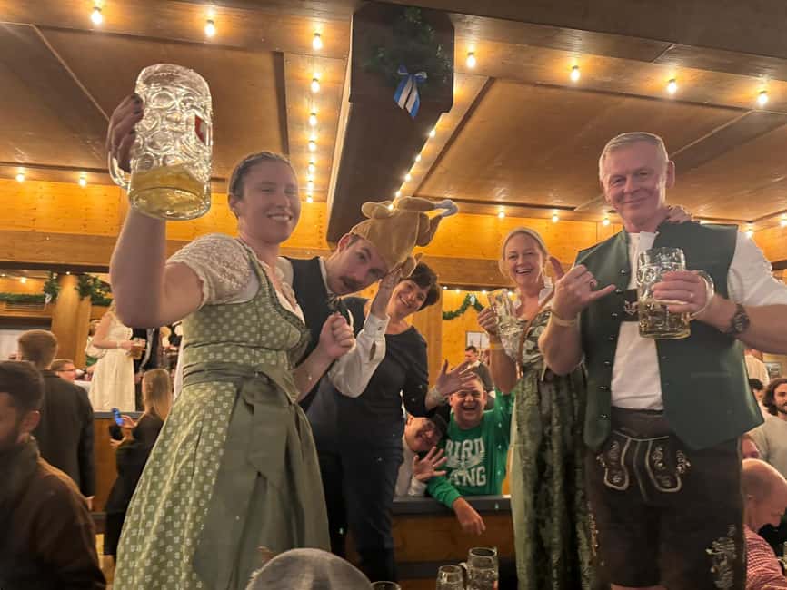 Munich: Oktoberfest Big Beer Tent Evening Table Reservation - Lederhosen and Dirndl meeting point, tickets, and the short walk