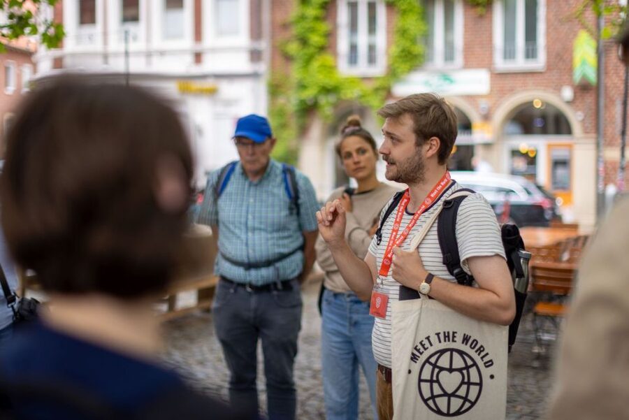Münster: Old Town Historical Walking Tour by "Geo Epoche" - Stop by Lambertikirche and hear how power shows up in a city