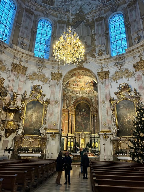 Private tour to Neuschwanstein castle from Munich - Oberammergau: painted buildings, Passion Play context, and a shopping window