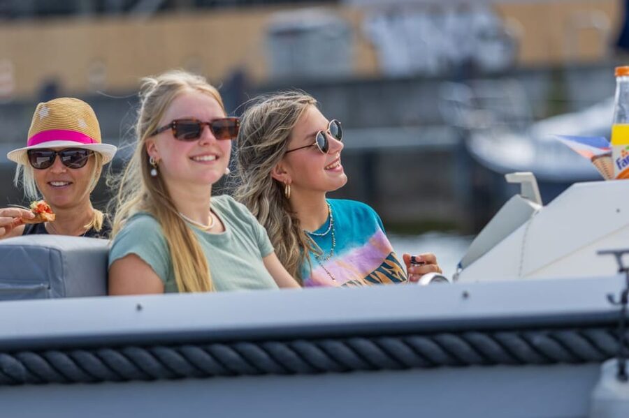 Rostock: Electric Boat Rental on the Warnow River - Getting the quick safety and steering briefing