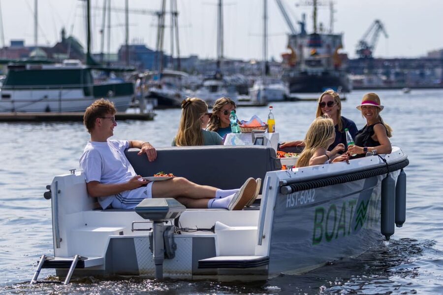 Rostock: Electric Boat Rental on the Warnow River - Comfort for up to 6: seating, table, and a real hangout pace