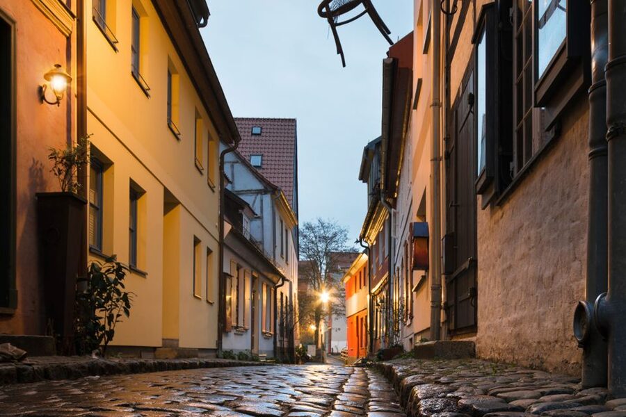 Stralsund: Old Town Evening Tour with a Night Watchman - Night watchman storytelling, right where the city creaks