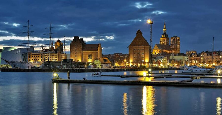 Stralsund: Old Town Evening Tour with a Night Watchman - Rathaus and St. Nicholas, where civic power shows up in stone