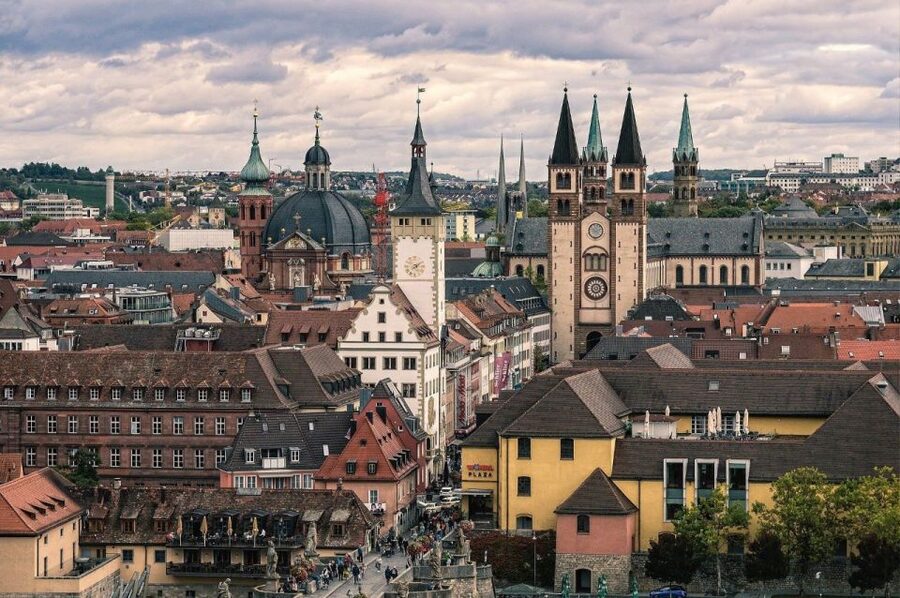 Würzburg: Private Walking Tour With Professional Guide - Neumünster church and Walther von der Vogelweide: the medieval layer you’ll remember